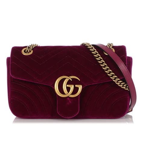 Sac bandoulière GG Marmont Flap en velours .